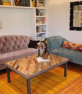 recycled pallet metal table with diagonal stripe patterned top