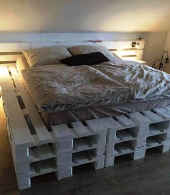 white painted stacked pallet bed