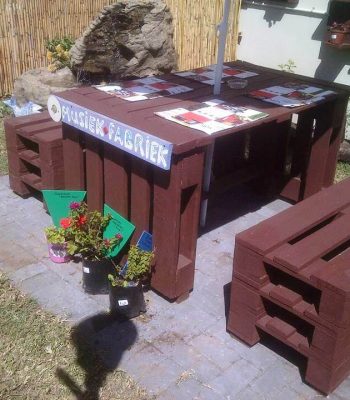 reclaimed pallet table with matching benches